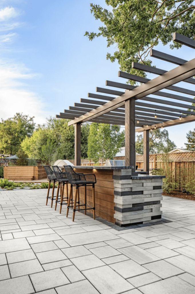 Covered pergola with a built-in outdoor bar